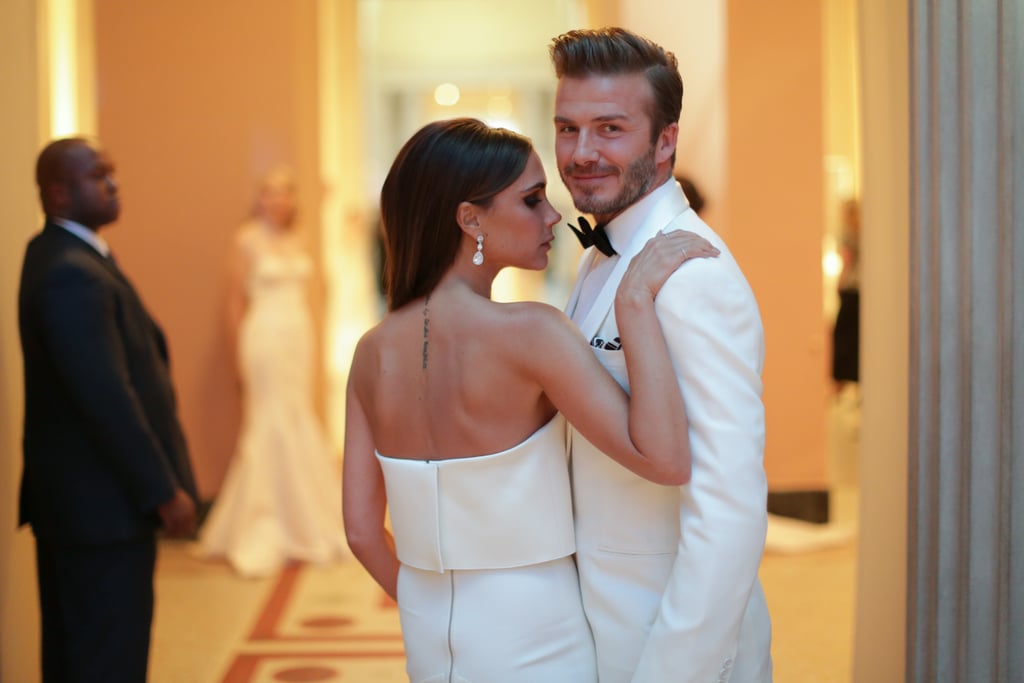 Victoria and David shared a supersweet moment at the Met entrance.