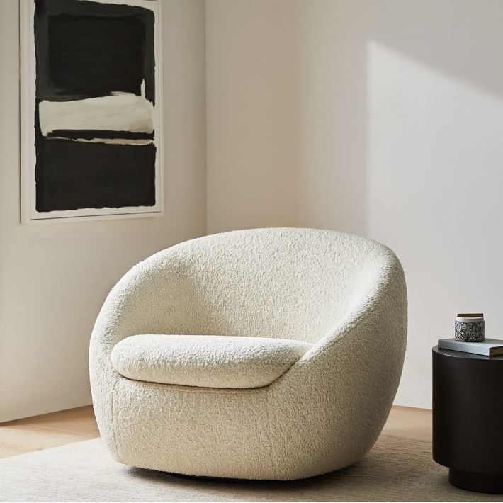 For Elegance and Comfort: Cosy Swivel Chair