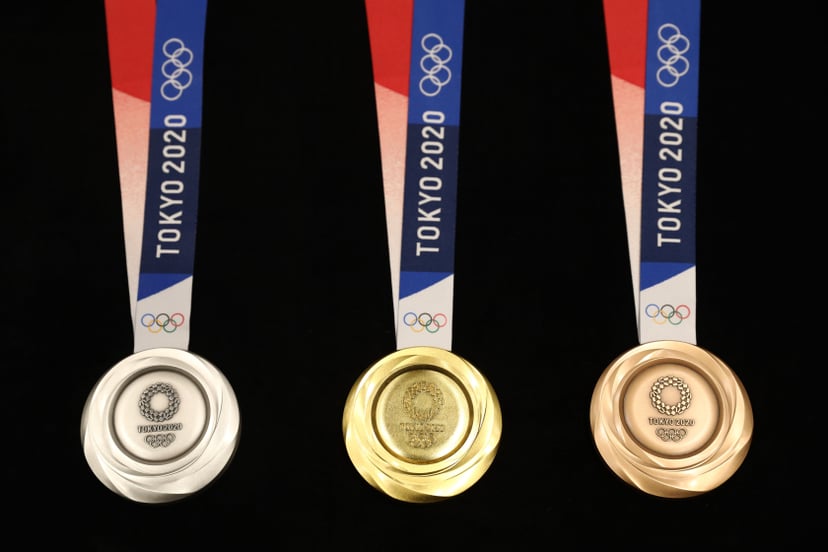 Medals for the Tokyo 2020 Olympic Games are unveiled during a ceremony marking one year before the start of the games in Tokyo on July 24, 2019. - Tokyo entered the final leg of its marathon Olympic preparations, marking a year until the 2020 Games open w