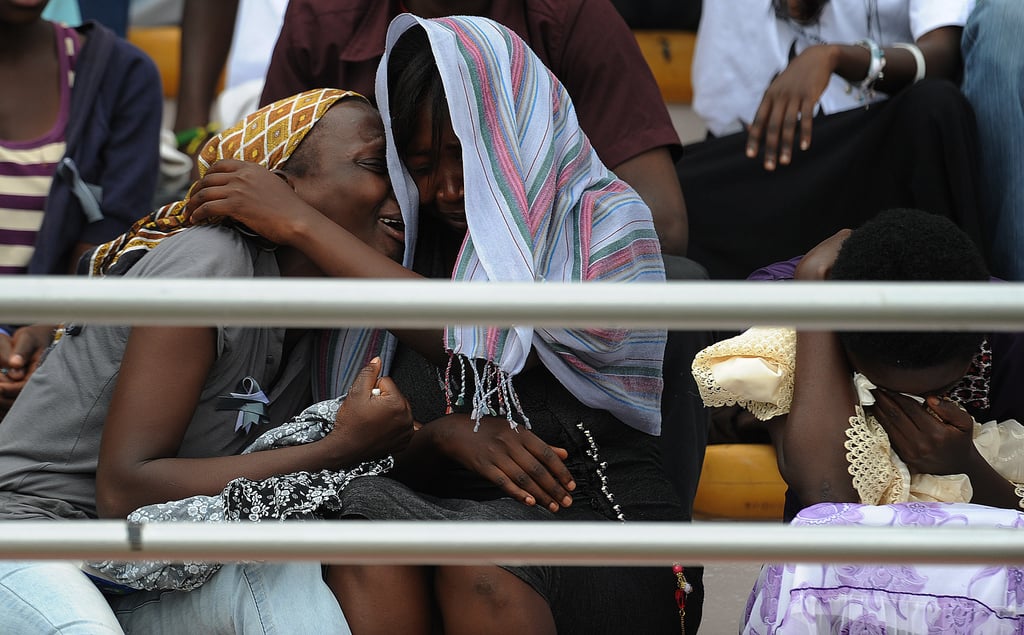 Women wept as they honored the lives lost in the 1994 slaughters.
