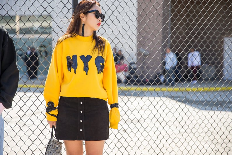 A Graphic Sweater to Be Accessorized With Statement Earrings and Shades