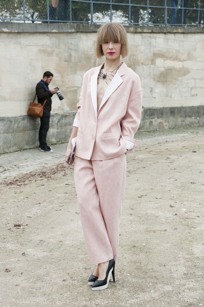 A pretty pink suit with a delicate but fierce necklace.
A pretty pink suit with a delicate but fierce necklace.