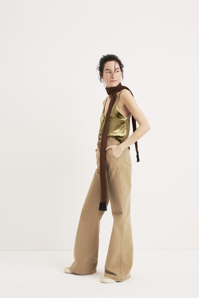 A skinny scarf accessorizes this sexy velvet cami.