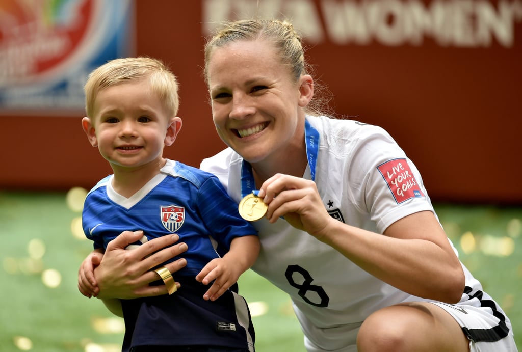Amy Rodriguez and Son After World Cup Win