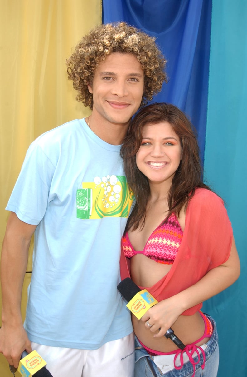 2003: American Idol finalists Justin Guarini and Kelly Clarkson perform in Miami.