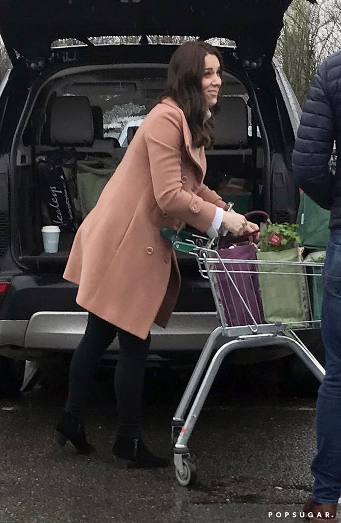 Before Kate Middleton was a member of Britain's most famous family, she was just a totally normal girl who played sports, lived in a London apartment with her younger sister, Pippa, and shopped at Waitrose supermarket like everybody else. Well, some things never change! 
On Monday, Kate was spotted picking up some groceries at a Waitrose supermarket in Swaffham, UK. The duchess, who wore a chic pink coat, took a spin around the store with her cart and was accompanied by her metropolitan police protection officer, who stood aside and kept an eye on her as she loaded her reusable bags into her car. Kate is likely stocking up for her family, which is set to expand very soon — Kate is currently pregnant with her third child — not that it's slowed her down at all — and is rumored to be giving birth in the next couple of weeks.

    Related:

            
            
                                    
                            

            What Did Kate Middleton Do Before Becoming a Royal?
        
    
Despite Kate being, you know, literal royalty, this actually isn't the first time we've gotten a glimpse of her doing a round of regular-person chores: back in 2013, just a few weeks after giving birth to Prince George, Kate was seen shopping at her local market on the island of Anglesey, where she and Prince William spent time as a new family of three. The day before her shopping trip, Kate was all dressed up for Easter church service with William at St. George's Chapel, where Prince Harry and Meghan Markle will tie the knot next month.

    Related:

            
            
                                    
                            

            Is This the Reason William and Kate Have Gone For Baby No. 3?