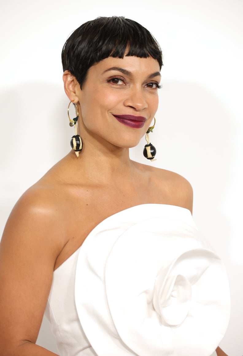 Rosario Dawson's bowl cut from the side.