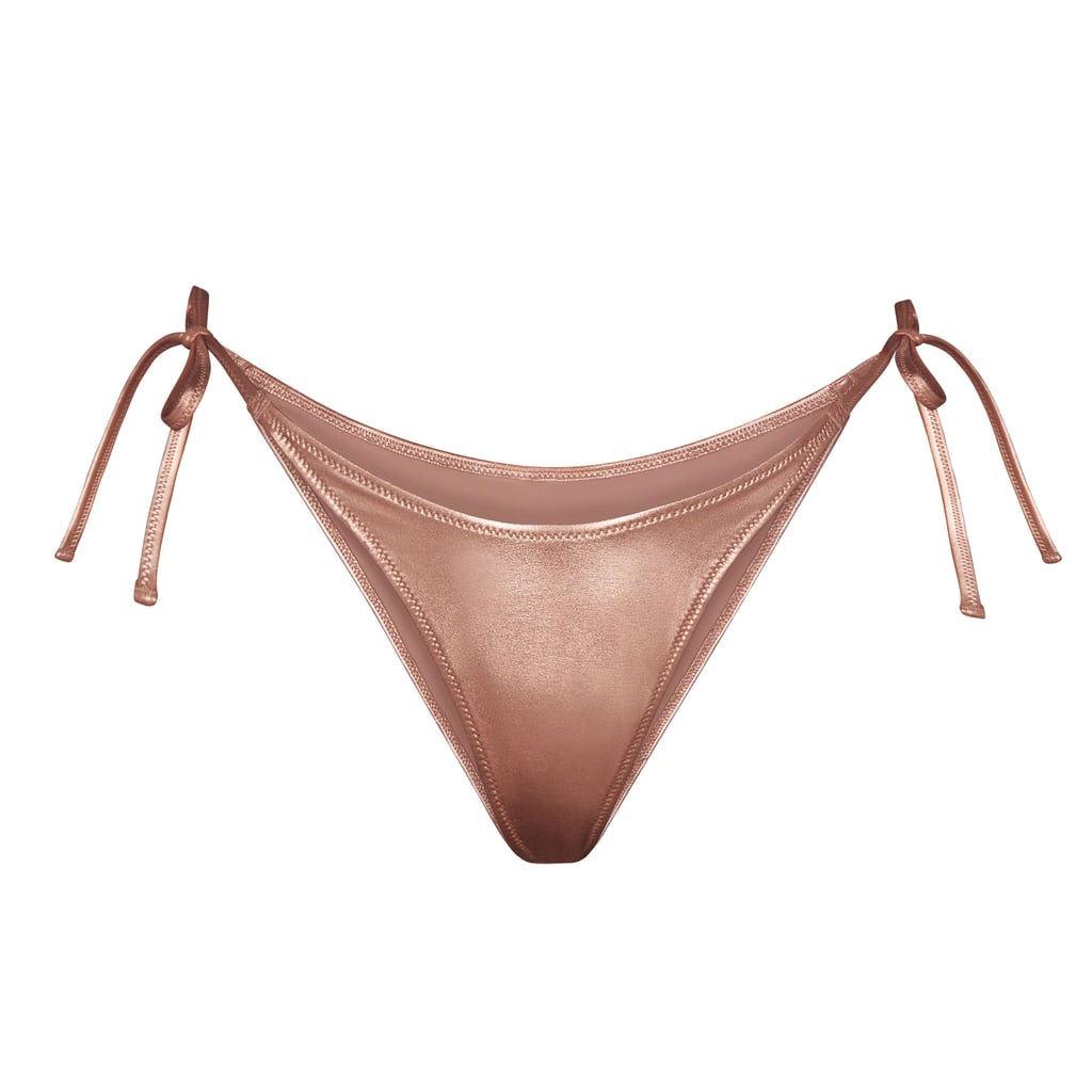 Skims Metallic Swim Dipped Tie Bottoms in Champagne ($48)