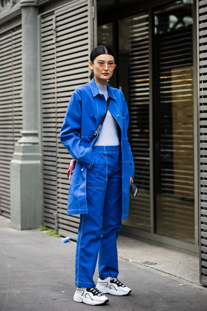 For a sporty look, accent a denim jacket and jeans with chunky sneakers and coloured sunglasses.