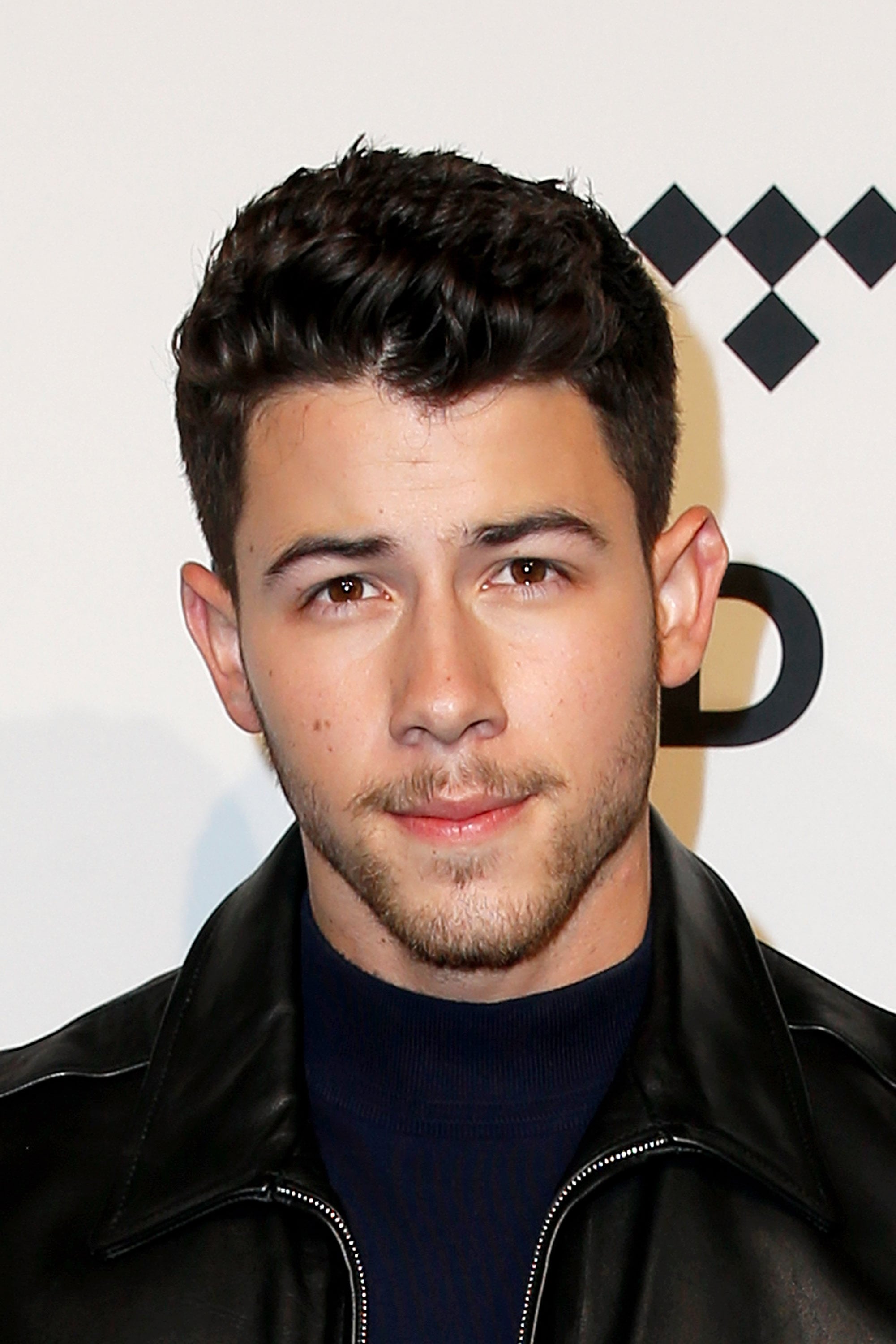 Nick Jonas is Marking His 29th Birthday By Giving Away a Signed Guitar -  CelebrityKind