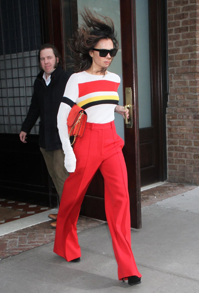 Victoria Beckham Red Wide Leg Pants and Striped Sweater Look for