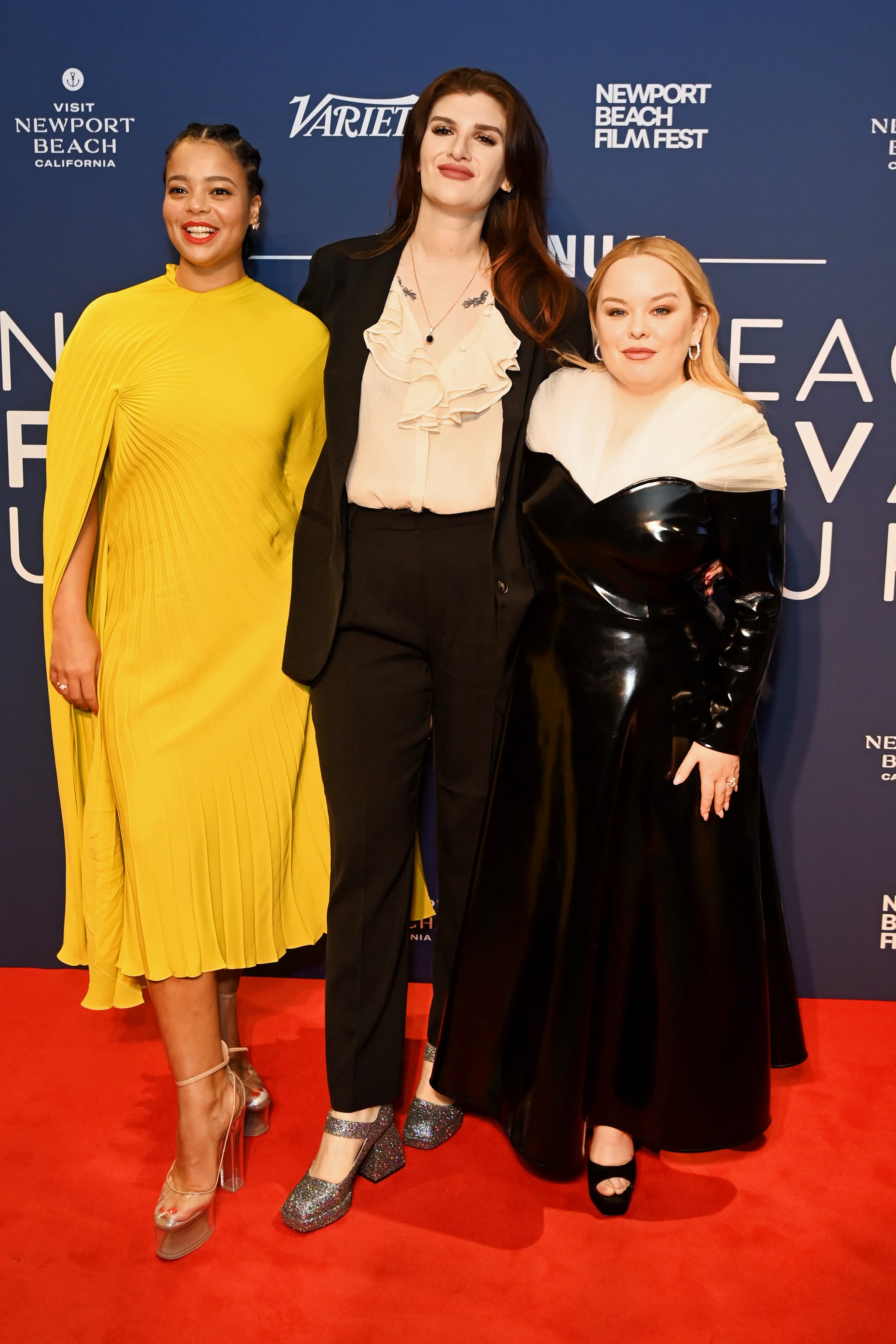 LONDON, ENGLAND - FEBRUARY 16: (L to R) Lydia West, Camilla Whitehill and Nicola Coughlan attend the Newport Beach Film Festival UK Honours 2023 at The Londoner Hotel on February 16, 2023 in London, England. (Photo by Dave Benett/Getty Images for Newport Beach Film Festival)