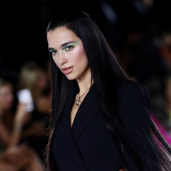 Dua Lipa Wears Versace Print Catsuit With Plunging Neckline