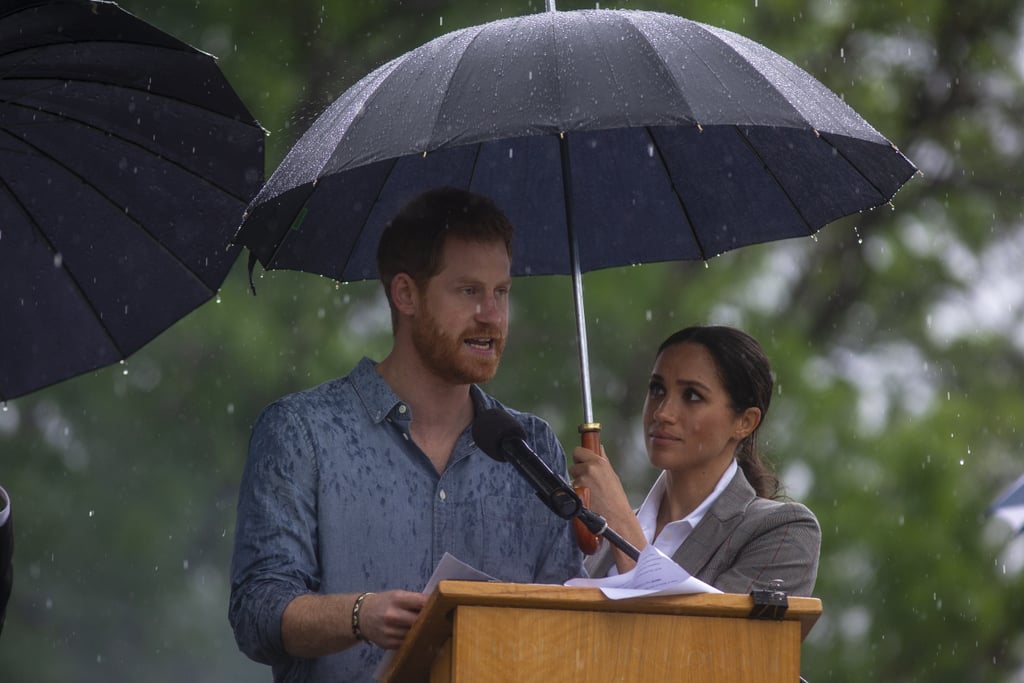 Meghan Markle Holding Prince Harry's Umbrella October 2018