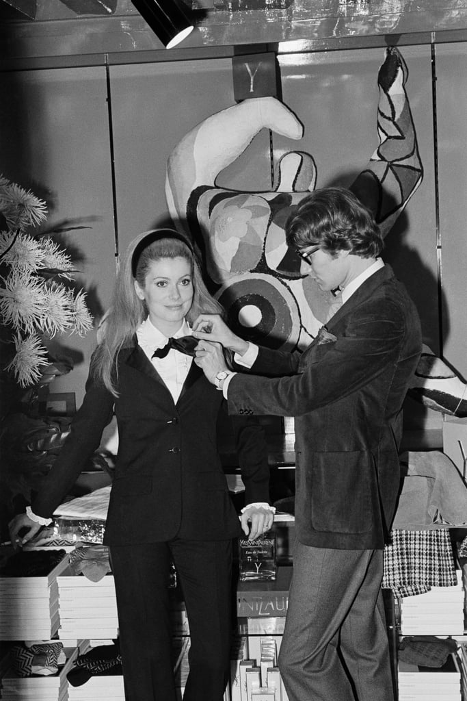 Catherine Deneuve modeled one of Yves Saint Laurent's outfits in 1966.
Catherine Deneuve modeled one of Yves Saint Laurent's outfits in 1966.