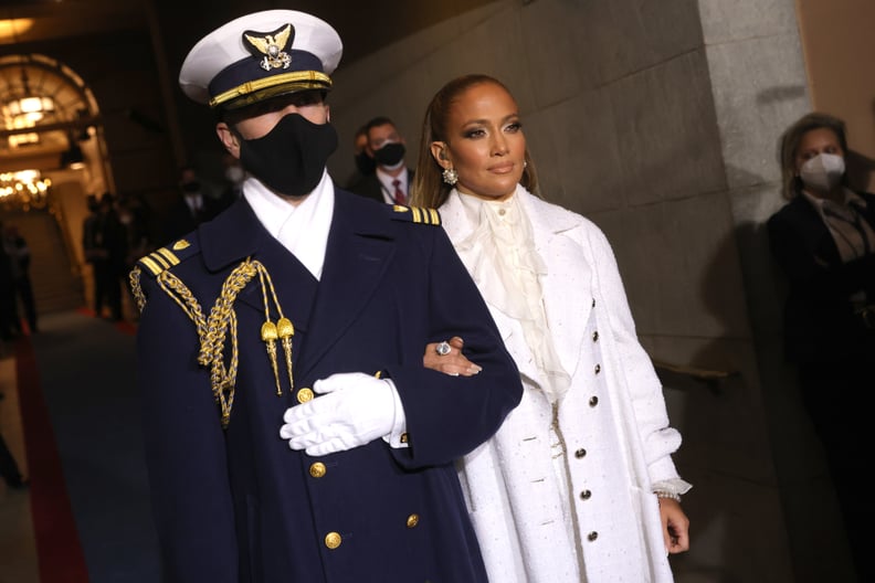 WASHINGTON, DC - JANUARY 20: Jennifer Lopez is escorted to  the inauguration of U.S. President-elect Joe Biden on the West Front of the U.S. Capitol on January 20, 2021 in Washington, DC.  During today's inauguration ceremony Joe Biden becomes the 46th pr