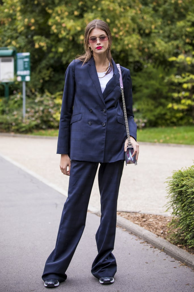 Kaia Gerber Was Seen Leaving the Chanel Show in a Pantsuit, Sneakers, and Pink Sunglasses