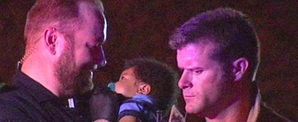 Viral Photo of a Police Officer Comforting a Baby