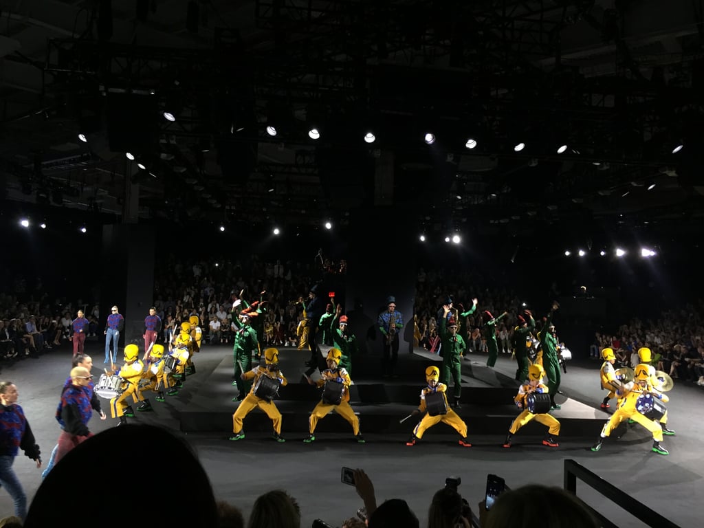 Before I could get my hands on anything, though, I settled into my seat for the fashion show — which was actually more of a show show. Models danced rather than walked around a square runway, there was a drum line, and musicians played a jazzed up version of "Express Yourself." I also got to see the clothes in action, and they proved to be pretty comfy and movable — important qualities when it comes to anything I wear.