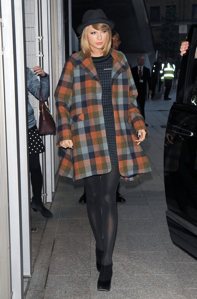 Taylor's colorful, plaid Novis coat would definitely stand out in a sea of black and gray outerwear.