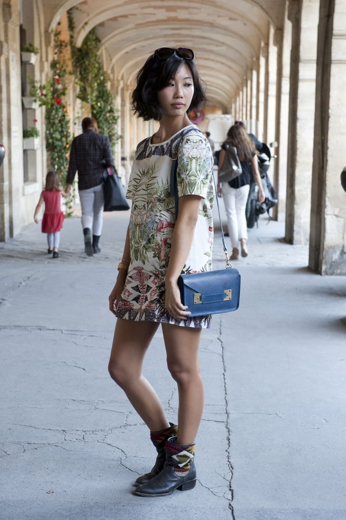 A botanical Zara dress got a tough-girl upgrade with those boots.
A botanical Zara dress got a tough-girl upgrade with those boots.