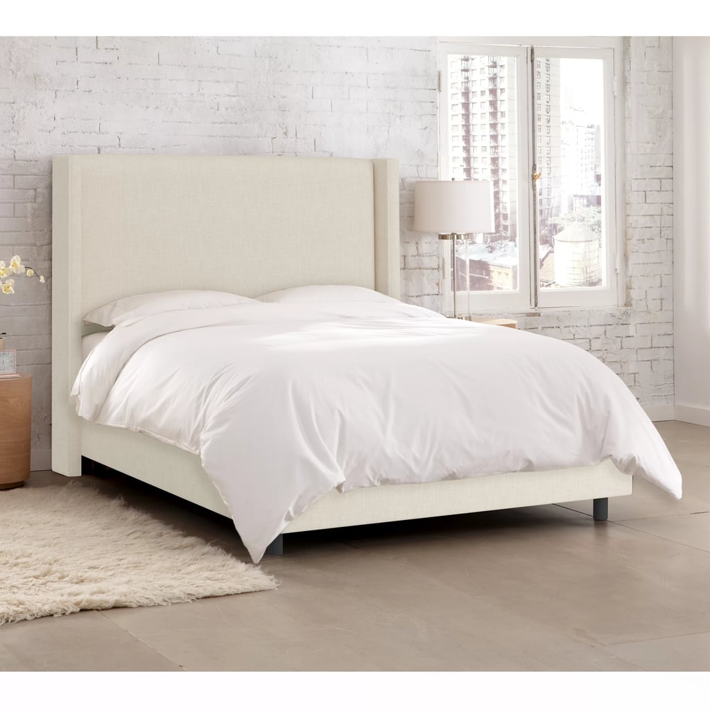 An Upholstered Bed: Hanson Upholstered Low Profile Standard Bed