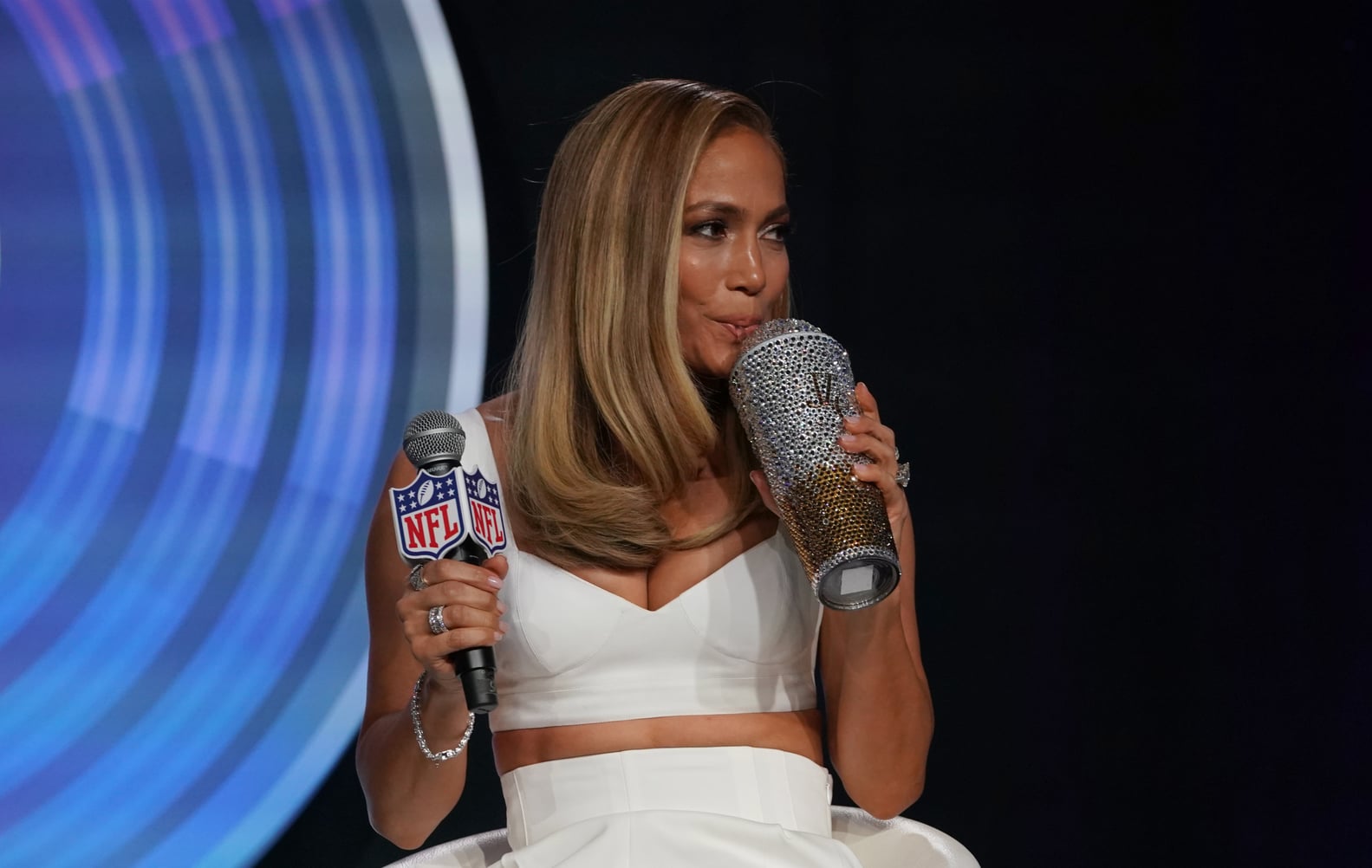 Jennifer Lopez's Football Clutch at Super Bowl Press Event | POPSUGAR ...