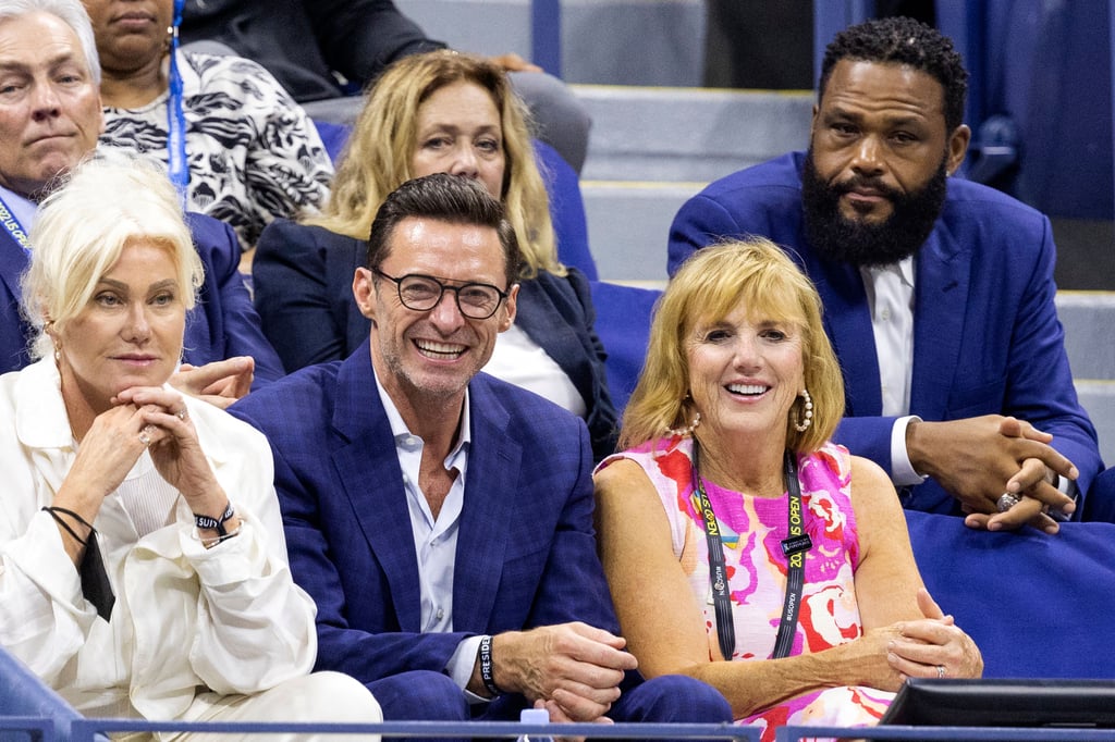 Hugh Jackman and his wife Deborra-Lee Furness on 29 Aug. at the US Open. Actor Anthony Anderson sits above them.