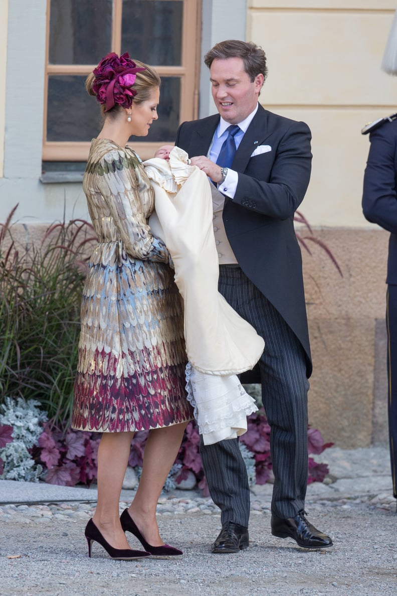 An Ornate Knee-Length Dress That Matches an Outstanding Headpiece