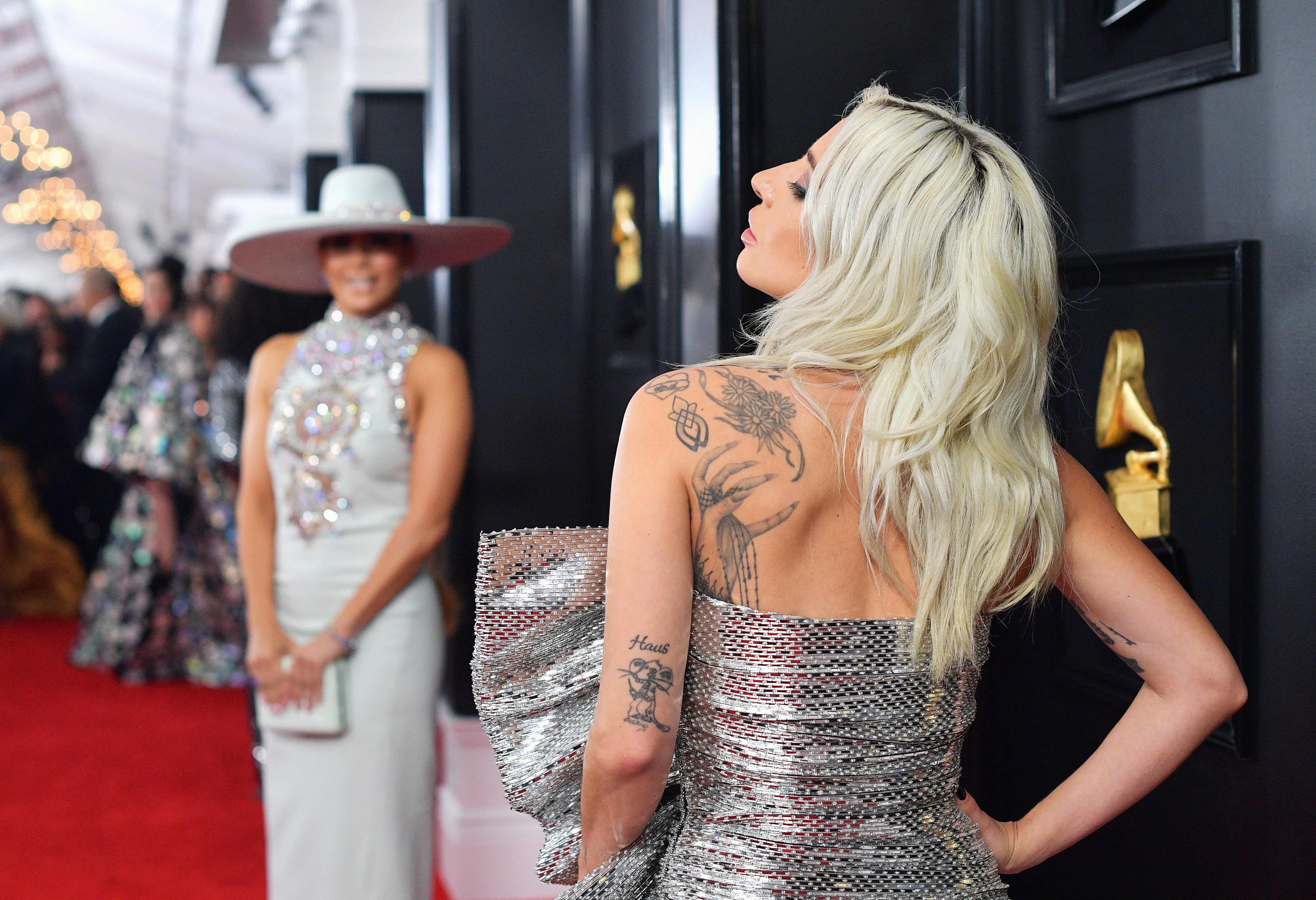 lady gaga celine dress I love thematic dressing and am totally obsessed with how Lady Gaga brought  her own Harley Quinn to the UK premiere of Joker: Folie  Deux. Wearing a  red Celine by Hedi