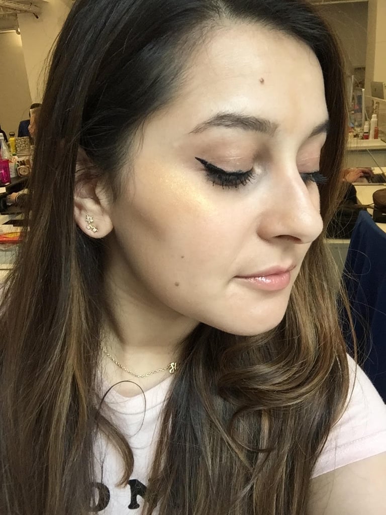 Who: Sarah Siegel, editorial assistant, Shopping and Products
Complexion: Medium olive
Review: "While I'm not crazy about how gold this highlighter is, I'm obsessed with the formula. It goes on ultrapigmented and creamy, making me eager to try the rest of the highlighter in the line. I might wear this shade to a music festival but not to work or during the day. "