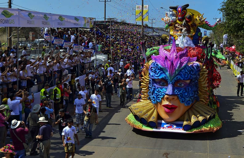 Carnival Queen Daniela Cepada performs atop a float during the carnival parade in Barranquilla, Colombia on February 9, 2013. Barranquilla's Carnival, a tradition cretaed by locals at the end of the 19th century as a response and to parody the celebration