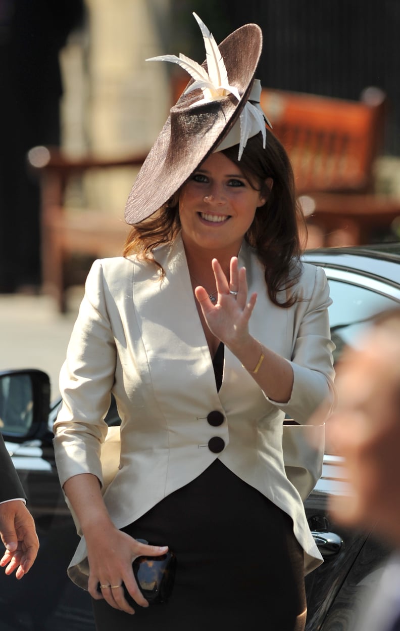 Princess Eugenie arrives for the wedding of Britain's Zara Phillips, granddaughter of Britain's Queen Elizabeth II, and England rugby player Mike Tindall at Canongate Kirk in Edinburgh, Scotland, on July 30, 2011. AFP PHOTO / BEN STANSALL (Photo credit sh