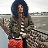 Paired With a Striped Shirt and Bright Bag