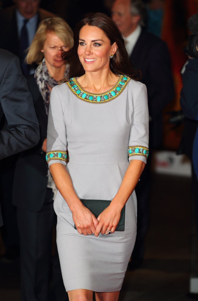 Kate accessorized with the same classic clutch and her engagement ring, but she wore crystal stud earrings that featured a yellow stone.
