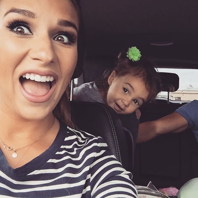 "Vivi photo bomb! Yes the car was in park and we were getting out :)."