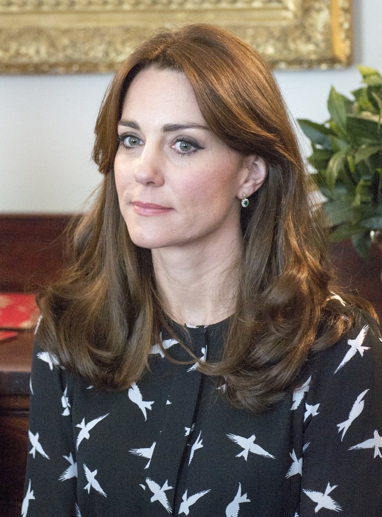 She also wore elegant emerald earrings.