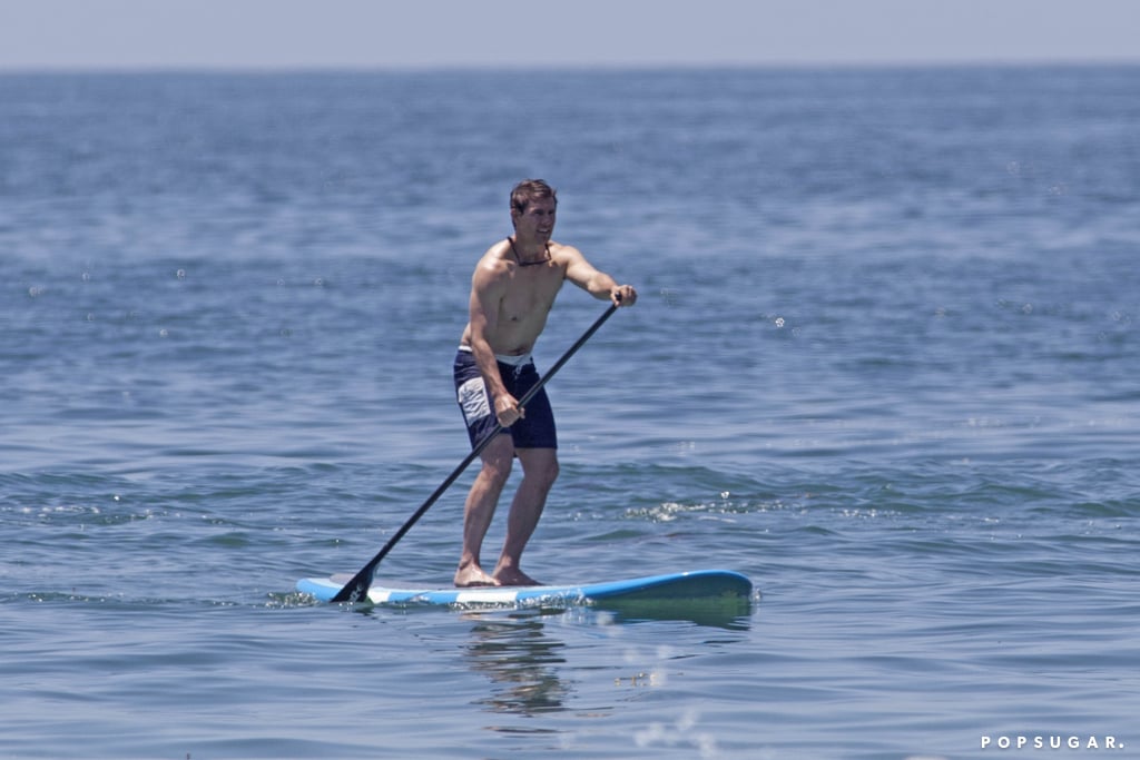 Tom Cruise showed off his toned physique for a paddle boarding session in Malibu in June 2013.