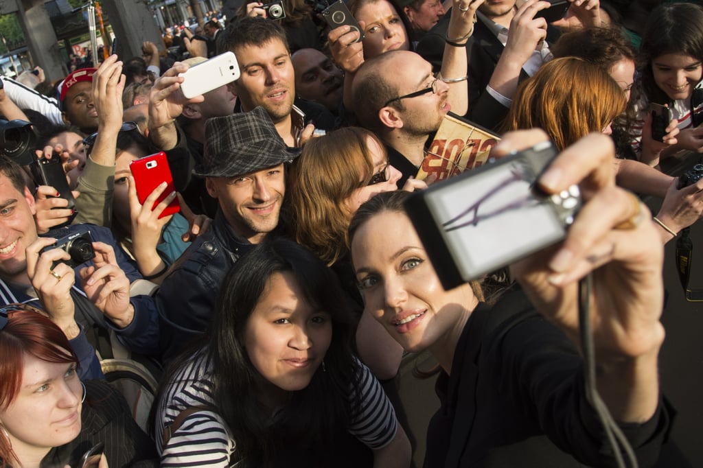 Angelina Jolie smiled for a photo while attending Brad Pitt's Paris premiere of World War Z in June 2013.