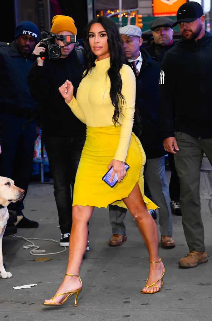 Kim Kardashian's Yellow Turtleneck and Suede Skirt in NYC