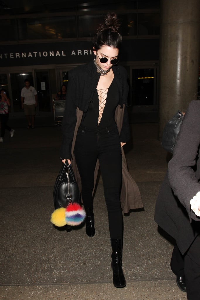 While Leaving LAX, She Was Spotted in a Lace-Up Top