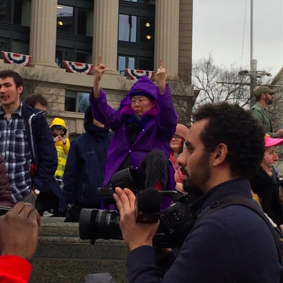 Woman Giving the Middle Finger During Trump's Speech