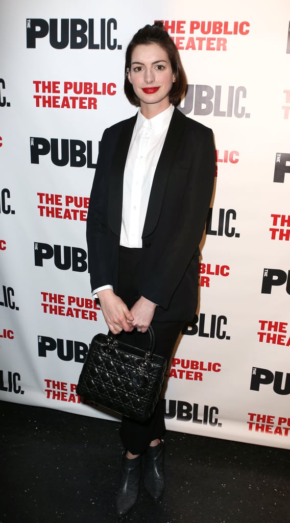 Anne Hathaway went with a black and white ensemble for a performance of Josephine and I in NYC on Tuesday.