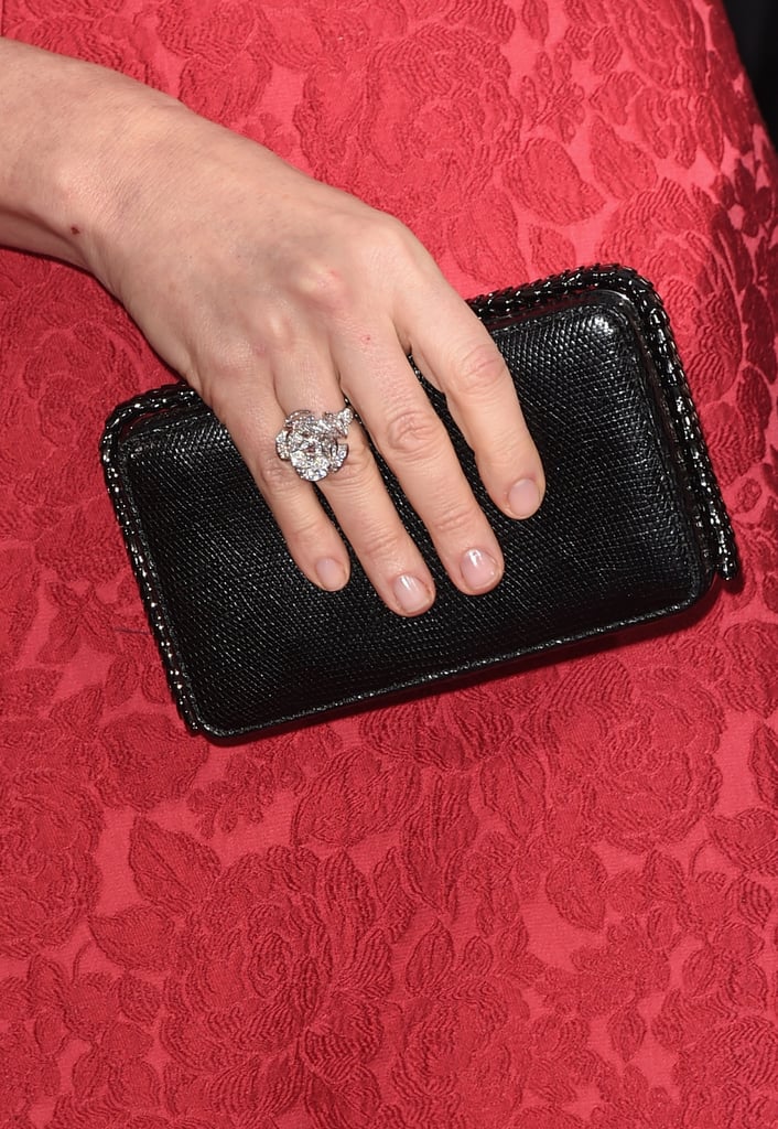 Julianna Margulies added Bulgari accessories to accent her gown.