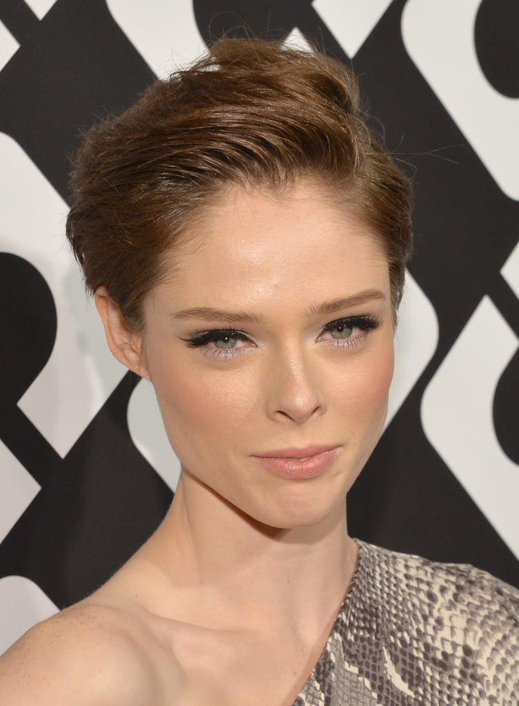 Coco Rocha proved that a pixie cut is incredibly versatile with this swept-up style, and her heavy eyeliner with just a touch of silver added a slightly sexy accent to her otherwise neutral makeup palette.