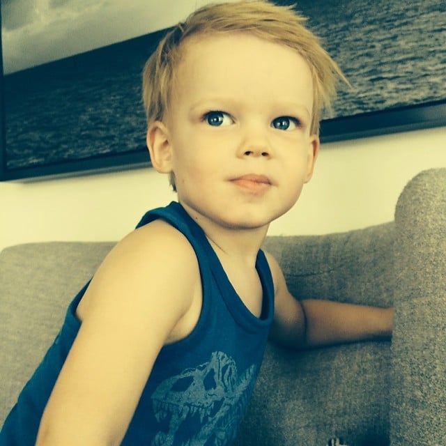 Luca Comrie perfected his modeling pose for his dad, Mike Comrie.
Source: Instagram user hilaryduff