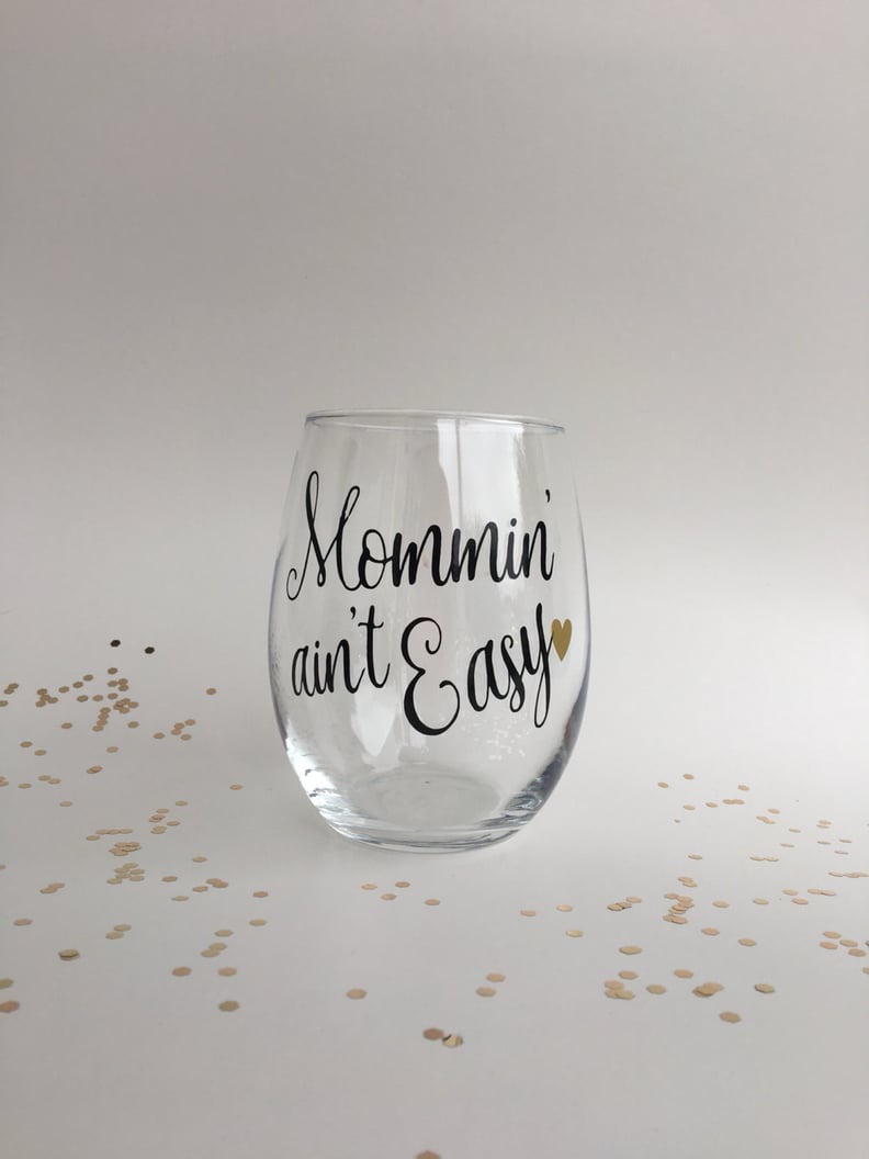 Mommin' Ain't Easy Wine Glass