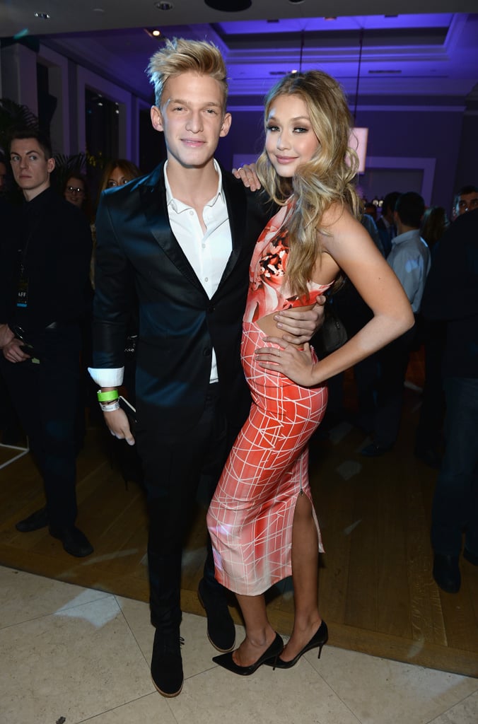 Gigi made quite a few appearances with former boyfriend Cody Simpson. She wore a cutout graphic print dress when she attended the Sports Illustrated swim celebration party in New York in 2014.
