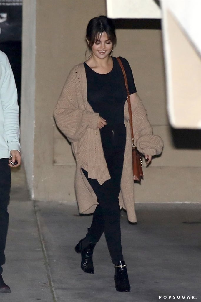Selena Gomez's Black Ankle Boots With Chains
