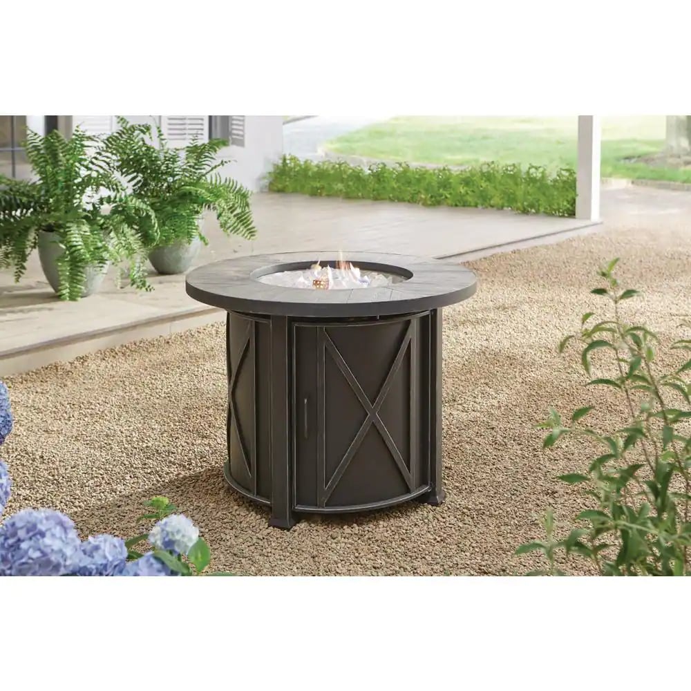 A Round Table: Hampton Bay Park Canyon 35 in. Round Steel Propane Fire Pit